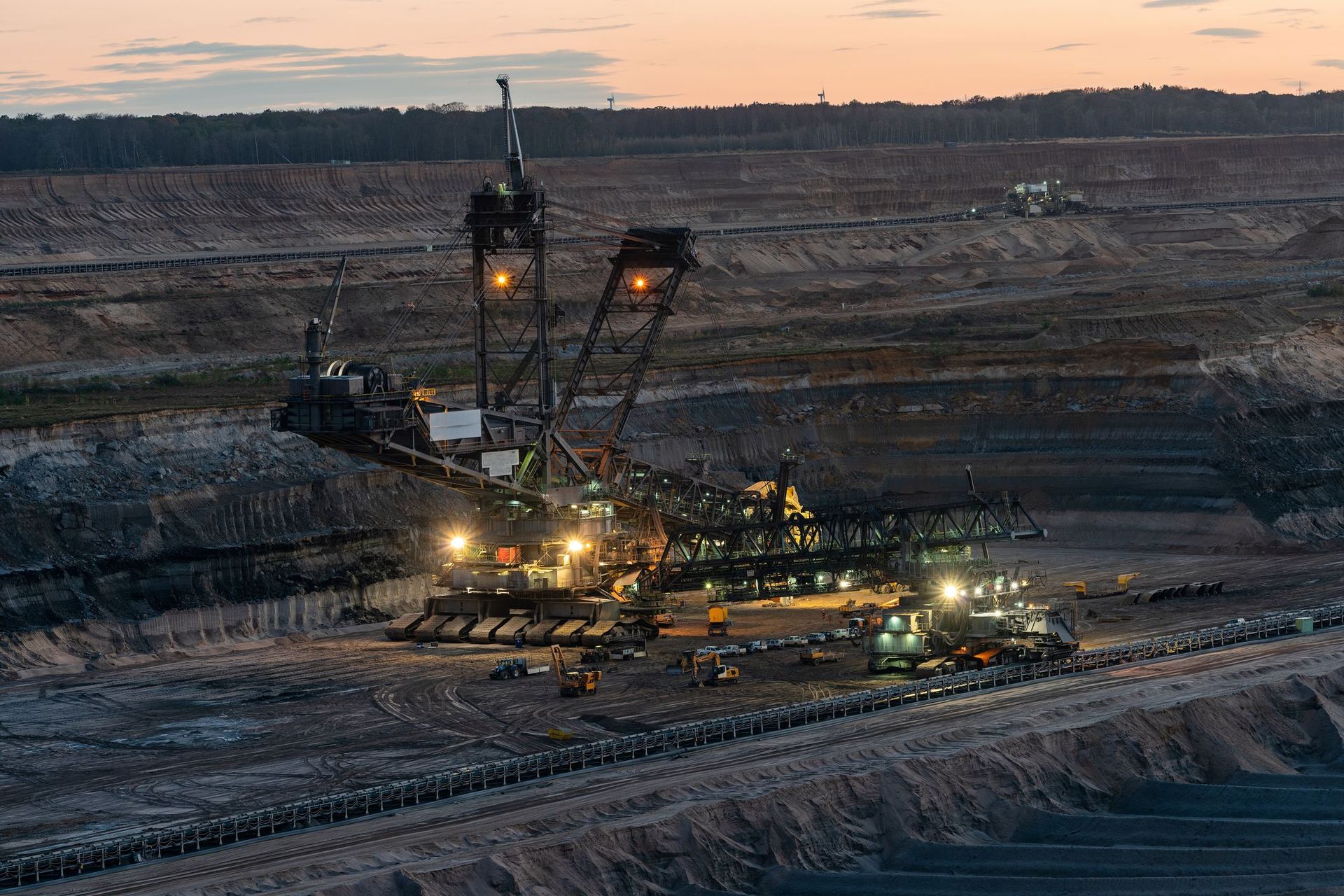 Large-scale opencast mining operation at dusk