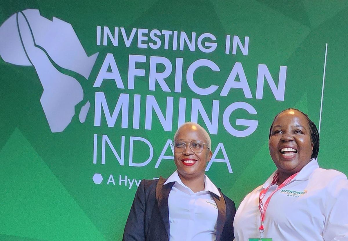 Ditsogo Group representatives at the Investing in African Mining Indaba backdrop